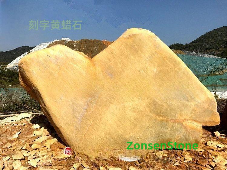Engraved yellow wax stone