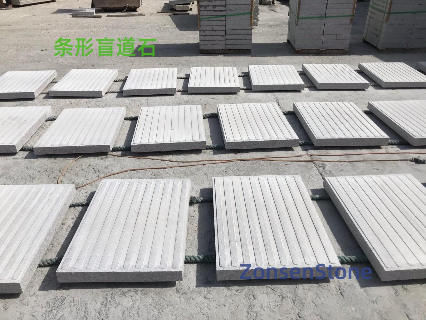 Strip tactile paving stones