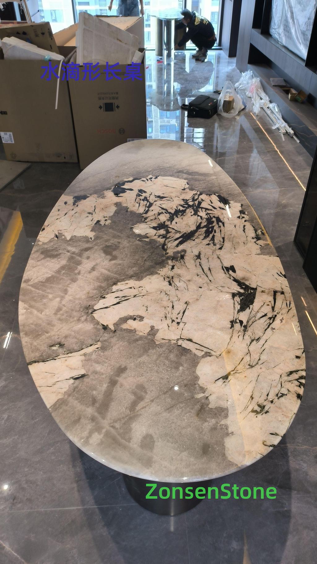 teardrop-shaped long table