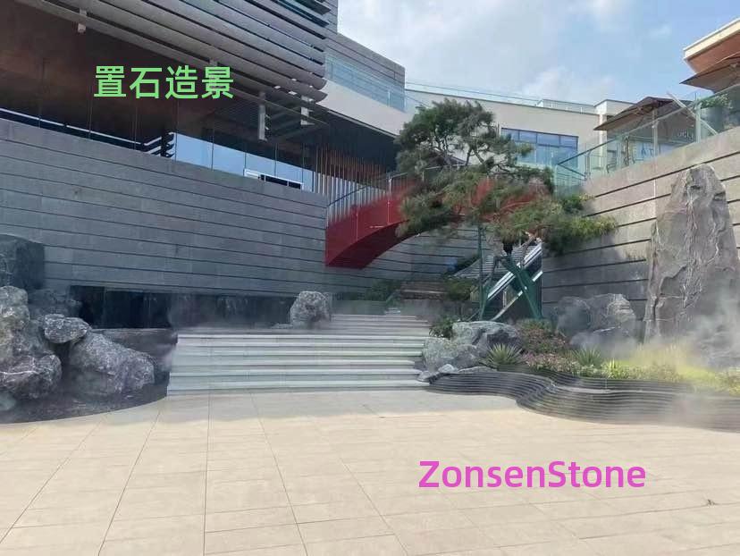 Rock placement and landscaping