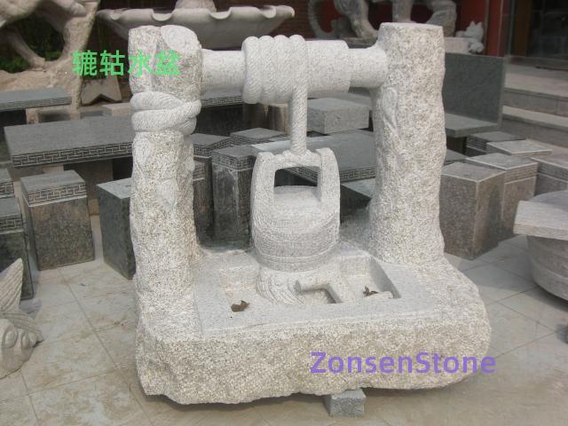 Water basin with a water wheel
