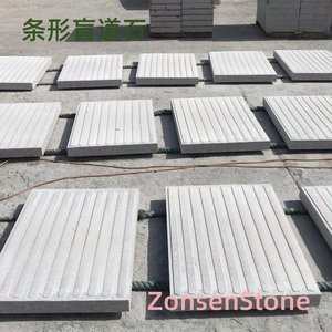 Strip tactile paving stones