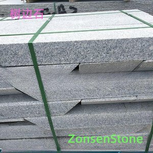 Stone by the tree