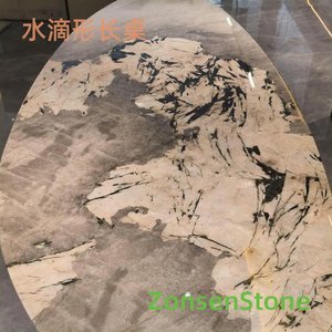 teardrop-shaped long table