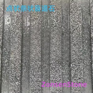 Dotted or striped tactile paving stones