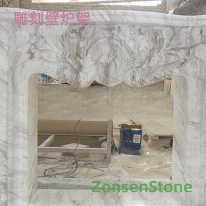Carved fireplace mantel